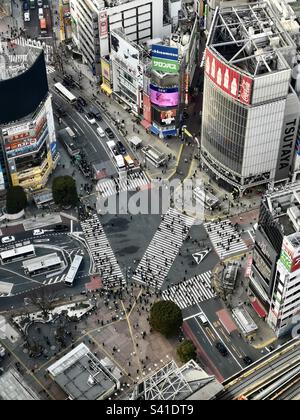 The iconic Shibuya crossing seen from the viewing deck on top of the Shibuya Scramble skyscraper in Tokyo, Japan. Stock Photo
