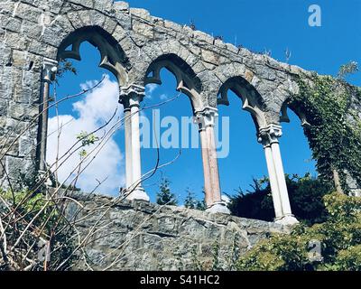 Hammond Castle Museum arches backed by blue skies and puffy cloud on summer day Stock Photo