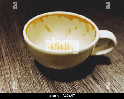 Empty coffee cup on wooden background Stock Photo
