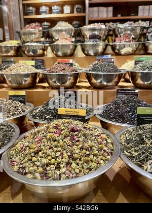 View of bins of various varieties of tea on the display of a market ...