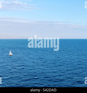 Sailboat in the ocean Stock Photo