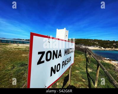 Zona Militar No Pasar sign on an outcrop on the Island of Mallorca Stock Photo