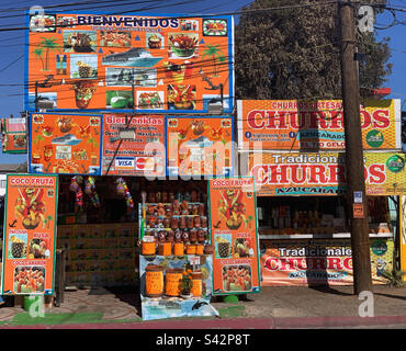 November, 2022, Colorful food stands, Malecon, Ensenada, Baja California, Mexico Stock Photo