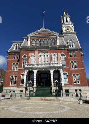 Norwich City Hall nestled on a slope within a hilly section of the downtown area. Located in Norwich, Connecticut, USA. Stock Photo