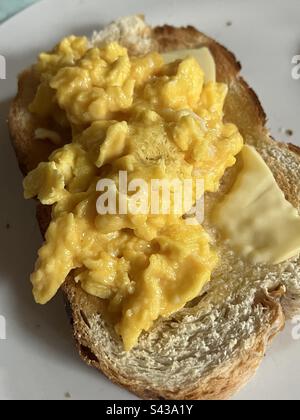 Scrambled eggs on toast Stock Photo