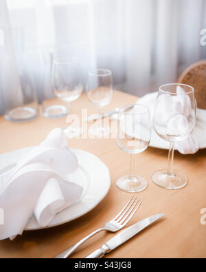 Simple but elegant table is set for two Stock Photo