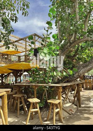 Outdoor wooden terrace of a beach restaurant in the Caribbean. Photo taken in Guadeloupe in January 2023 Stock Photo