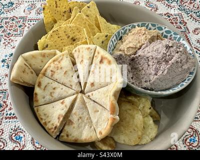 Hummus, Pitta, Chips and Crisps Stock Photo