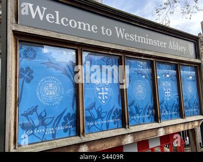 London, UK - 5.5.2023: posters on coronation route of King Charles iii and Queen Camilla tomorrow, at Westminster Abbey Stock Photo