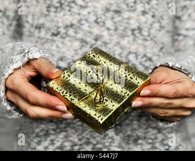 Golden gift box Stock Photo