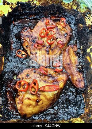 Burnt Korean BBQ chicken Stock Photo