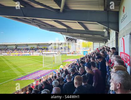 Burton Albion v Barnsley 7.4.23 Barnsley fans stood on the away