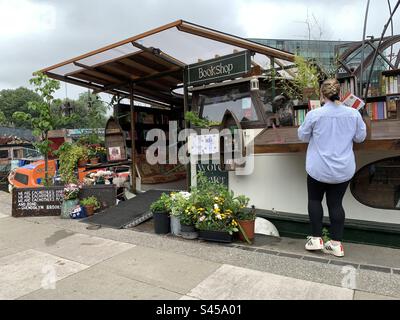 London, UK - 28 June 2023 : Word on the water, book shop on a barge, Regents canal Kings Cross. Stock Photo