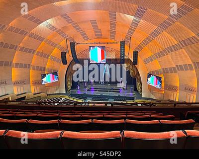 The stage and extensive seating in the radio city music Hall in Rockefeller Center as shown as part of a guided tour, 2023, New York City, USA Stock Photo
