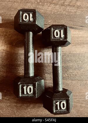 Two ten pound dumbbells Stock Photo