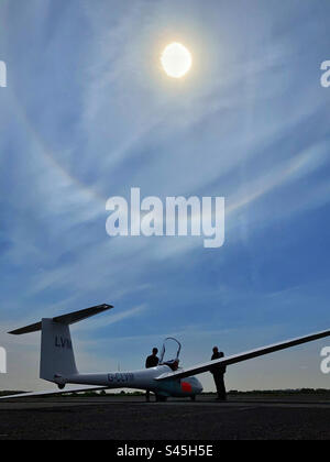 Glider pilots at York Gliding Centre with sun halo Stock Photo