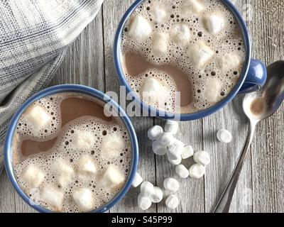 Hot chocolate in blue mugs Stock Photo