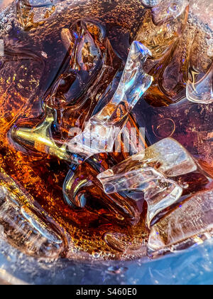 Refreshing cola with ice cubes in glass isolated on white Stock Photo ...