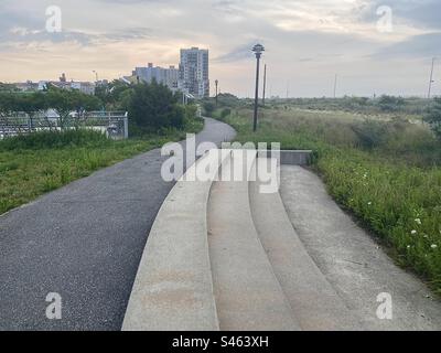 A photo of a park near the boardwalk in Far Rockaway Stock Photo