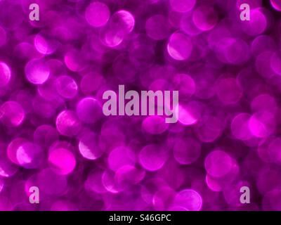Glittery purple bokeh background Stock Photo