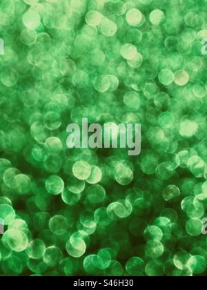 Vertical green glitter bokeh background Stock Photo