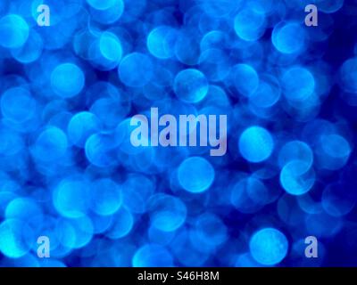 Glittery blue bokeh effect Stock Photo