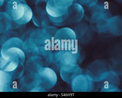 Glittery blue bokeh background Stock Photo