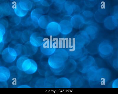 Glittery blue bokeh effect Stock Photo