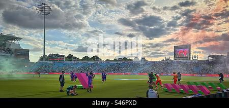 The Birmingham Phoenix opening batsmen enter the field as they prepare to face the Northern Superchargers bowling attack. The Hundred 3.8.23 - Headingley Stadium, Leeds, Yorkshire County Cricket Club. Stock Photo