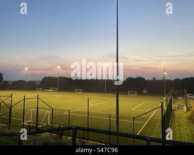 Late night dusk on a 3G football pitch. Stock Photo