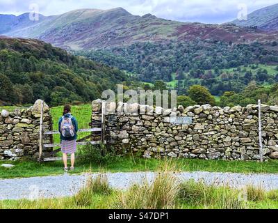 Walker taking in the view at the Lake District around Ambleside Stock Photo