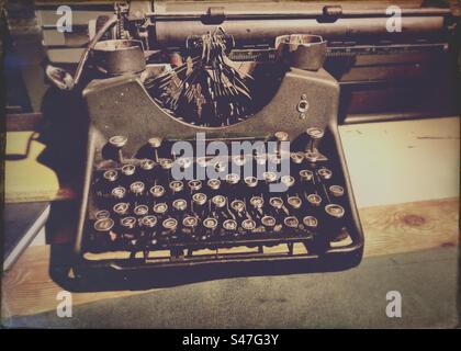Vintage typewriter on a desk Stock Photo