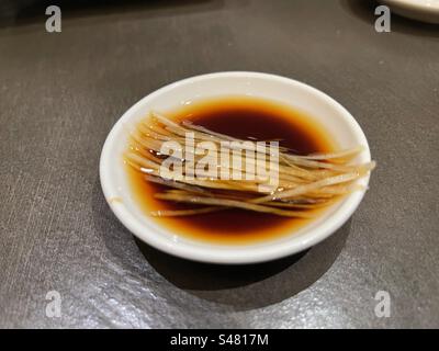 Xiao Long Bao dip of finely sliced ginger, soy sauce, and rice wine vinegar Stock Photo