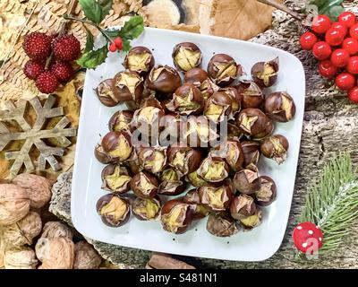 Christmasy roasted chestnuts flat lay Stock Photo