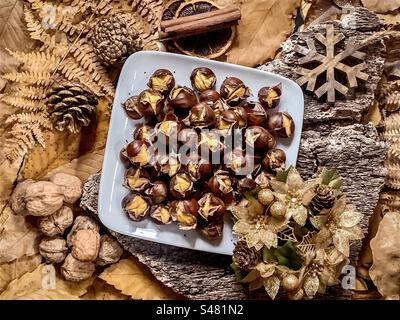 Christmasy roasted chestnut flat lay Stock Photo