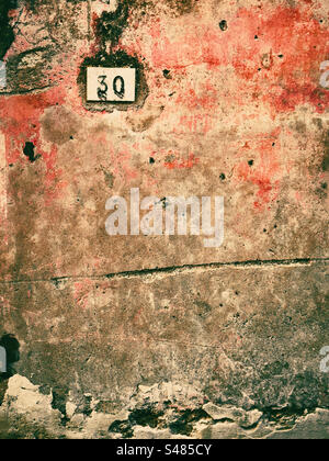 30 Red painted wall: Phillip Roberts Stock Photo