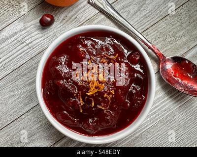 Homemade cranberry sauce in a white bowl viewed from above Stock Photo