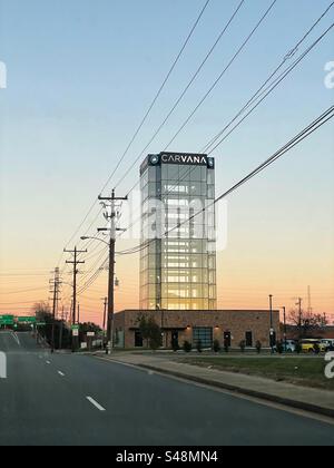 An empty Carvana vending machine tower in Richmond, VA at sunset. Stock Photo