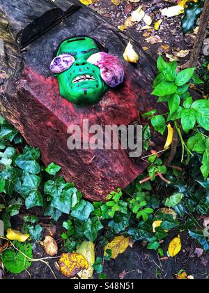 Halloween mask in the garden Stock Photo