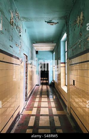 Empty hallway in an abandoned hospital Stock Photo