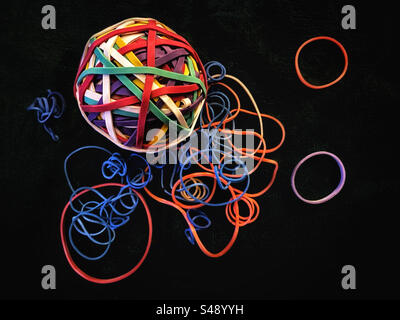 Rubber bands and a rubber band ball Stock Photo
