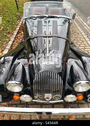 Broadway, Cotswolds, England, UK - November 2023: Close up view of a classic Morgan convertible sports car Stock Photo