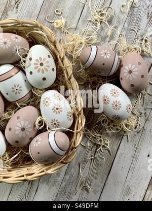 Painted Easter eggs in a basket Stock Photo