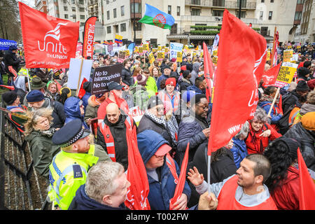 London, UK, 16th Mar 2019.  Protesters in central London.  A march, organised by activist groups 'Stand Up to Racism' and 'Love Music Hate Racism', and supported by unions TUC and UNISON, proceeds from Hyde Park Corner via Piccadilly and Trafalgar Square to Whitehall and Downing Street in Westminster. Similar events are held in other locations on UN Anti Racism Day. Credit: Imageplotter/Alamy Live News