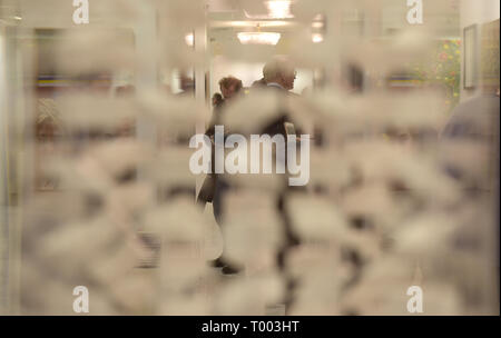 Vienna, Austria. 16th Mar, 2019. People look at artworks displayed on an exhibition of Art Vienna 2019 at the Hofburg in Vienna, Austria, March 16, 2019. The three-day exhibition will last until March 17. Credit: Guo Chen/Xinhua/Alamy Live News Stock Photo