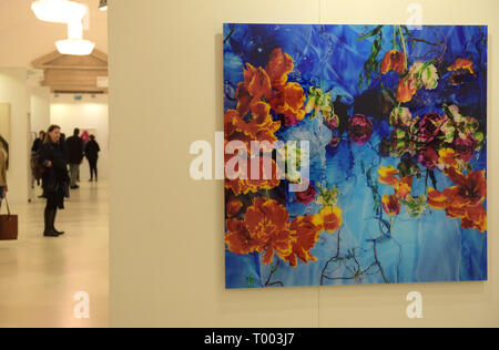 Vienna, Austria. 16th Mar, 2019. People look at artworks displayed on an exhibition of Art Vienna 2019 at the Hofburg in Vienna, Austria, March 16, 2019. The three-day exhibition will last until March 17. Credit: Guo Chen/Xinhua/Alamy Live News Stock Photo