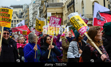 London, UK.  16 March 2019. People carry signs during a Stand Up To Racism and Stand Up To Islamophobia march through the capital. Credit: Stephen Chung / Alamy Live News Stock Photo