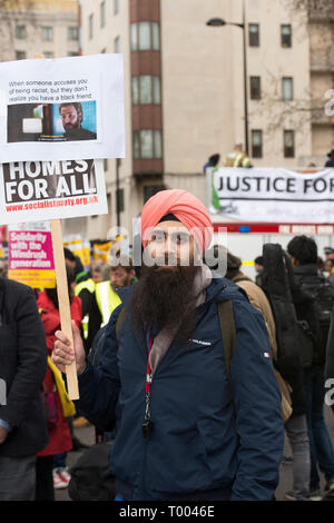 London, UK. 16th March, 2019. Protestors prepare to march in solidarity against racism and xenophobia.   In picture, 26 year old Teacher Singh.   Singh from Gravesham, Kent, says he has seen a rise in 'anti-imigrant behaviour' across his constituency. He expressed his outrage over the use of divisive language during the 2016 Brexit campaign. He believes that 'central government... has to clamp down on the s Credit: Byron Kirk/Alamy Live News