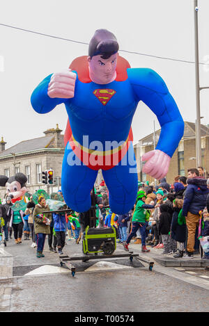 Athlone Town, Ireland. 16th March 2019. A large blow-up superman float makes it was down the route of the 2019 Athlone St Patricks Day Parade. Credit: Eoin Healy/Alamy Live News Stock Photo