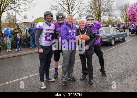 Athlone Town, Ireland. 16th March 2019. The Town Mayor of Athlone, Co Westmeath, Frankie Keena, poses with team members of the Minotaurs Athlone American Football Team. Credit: Eoin Healy/Alamy Live News Stock Photo